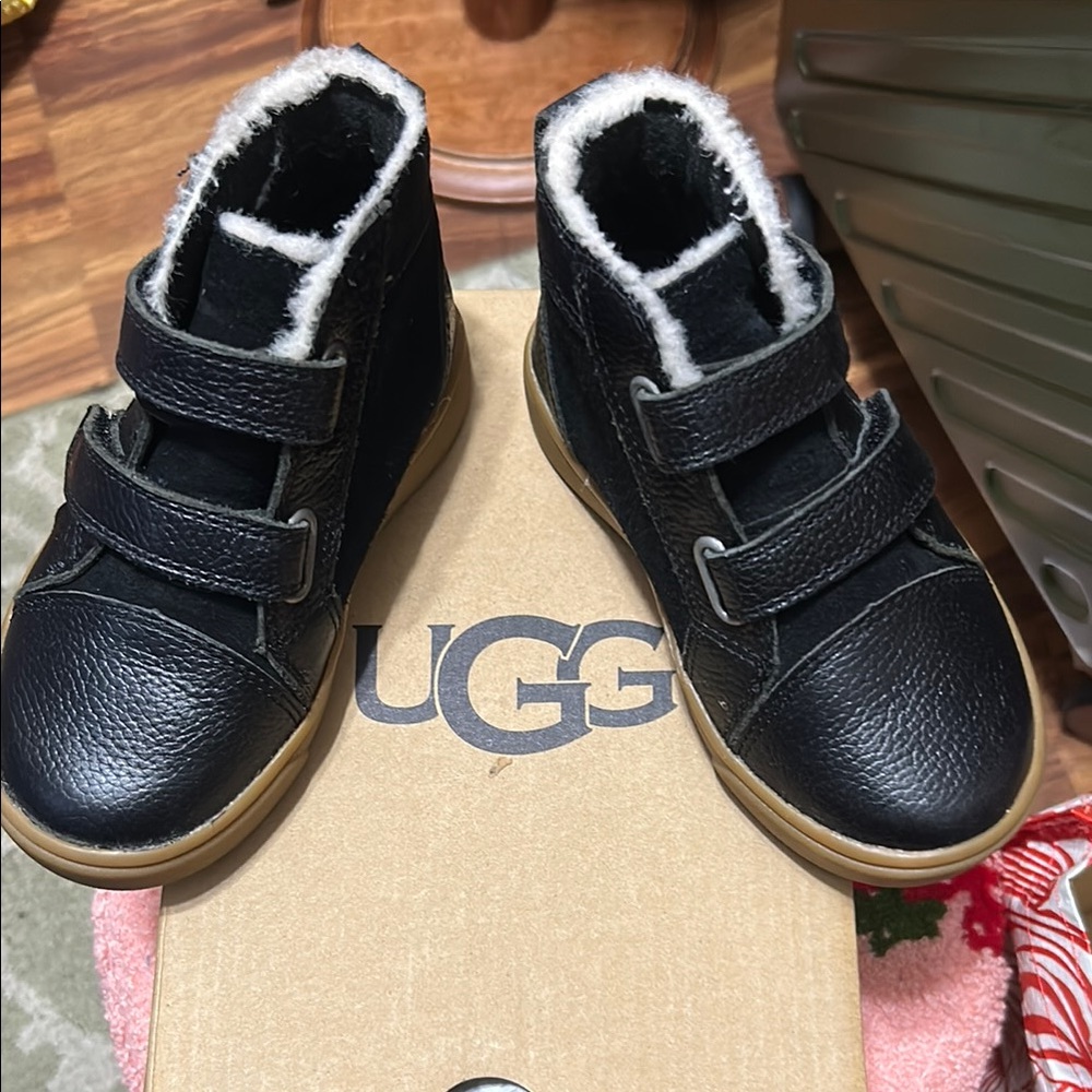 UGG Kids Black and Tan Bottom Boots